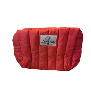 New Sol De Janeiro TSA-approved quilted travel pouch in Red - Cheirosa 40